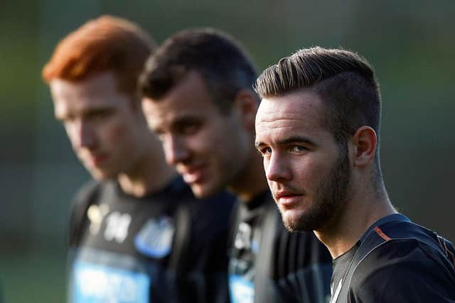 Adam Armstrong with Newcastle United team-mates Steven Taylor and Jack Colback in 2014.