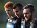 Adam Armstrong with Newcastle United team-mates Steven Taylor and Jack Colback in 2014.
