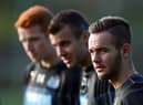 Adam Armstrong with Newcastle United team-mates Steven Taylor and Jack Colback in 2014.