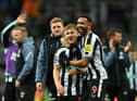 Matt Ritchie and Callum Wilson of Newcastle United celebrate following the Premier League match between Newcastle United and Wolverhampton Wanderers at St. James Park on March 12, 2023 in Newcastle upon Tyne, England. (Photo by Michael Regan/Getty Images)