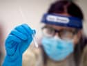 The Government have confirmed that 850 Covid tests have been wrongly recorded as positive. Photo: Getty Images.
