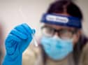 The Government have confirmed that 850 Covid tests have been wrongly recorded as positive. Photo: Getty Images.