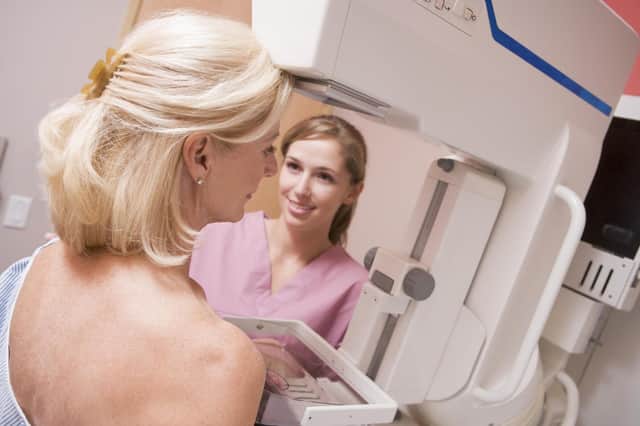 A patient having a breast cancer screening test.