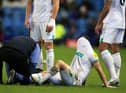 Newcastle United's Scottish midfielder Matt Ritchie receives medical treatment during the English FA Cup third round football match between Sheffield Wednesday and Newcastle United at Hillsborough Stadium in Sheffield, northern England on January 7, 2023. (Photo by LINDSEY PARNABY/AFP via Getty Images)