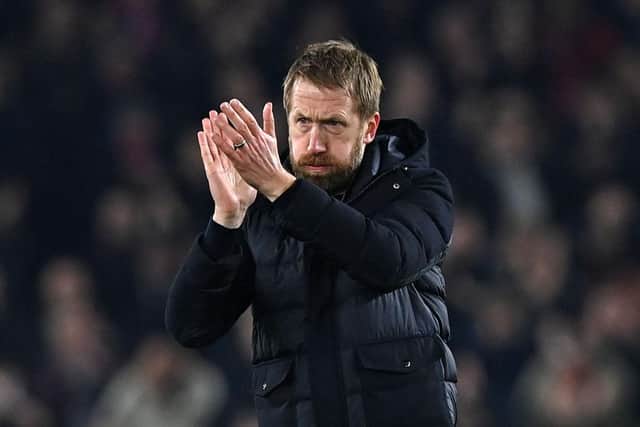 Brighton's English manager Graham Potter applauds the fans at the end of the game during the English Premier League football match between Brighton and Hove Albion and Crystal Palace at the American Express Community Stadium in Brighton, southern England on January 14, 2022.(Photo by GLYN KIRK/AFP via Getty Images)