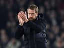 Brighton's English manager Graham Potter applauds the fans at the end of the game during the English Premier League football match between Brighton and Hove Albion and Crystal Palace at the American Express Community Stadium in Brighton, southern England on January 14, 2022.(Photo by GLYN KIRK/AFP via Getty Images)