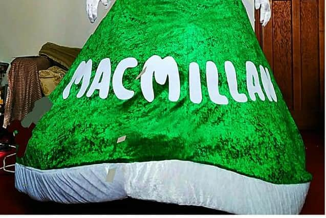 Colin in his Macmillan dress.