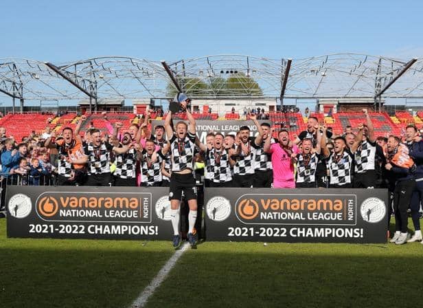 Gateshead captain Greg Olley lifts the National League North League title (photo: Charles Waugh).