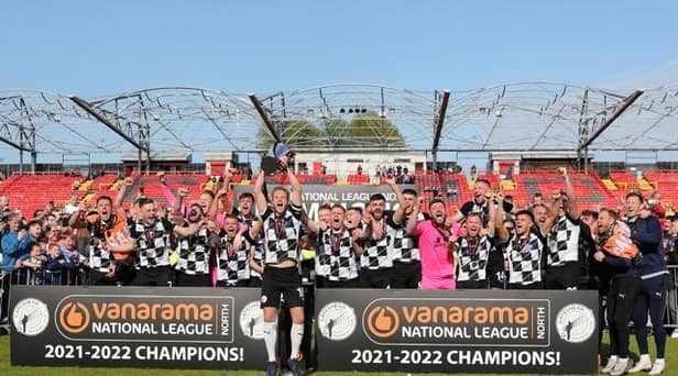 Gateshead captain Greg Olley lifts the National League North League title (photo: Charles Waugh).