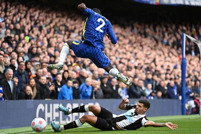 Chelsea's Antonio Rudiger is challenged by Newcastle United's Bruno Guimaraes.
