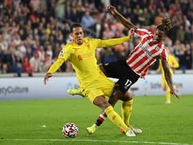 Virgil van Dijk of Liverpool tangles with Ivan Toney of Brentford. (Photo by Justin Setterfield/Getty Images)