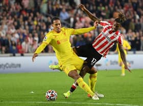 Virgil van Dijk of Liverpool tangles with Ivan Toney of Brentford. (Photo by Justin Setterfield/Getty Images)