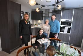 Stacie Reed, her husband Nathan, and daughter Lexi move into their new home at Old Durham Gate