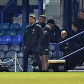 Lee Johnson watches his side produce a superb performance at Fratton Park