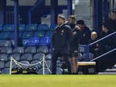 Lee Johnson watches his side produce a superb performance at Fratton Park