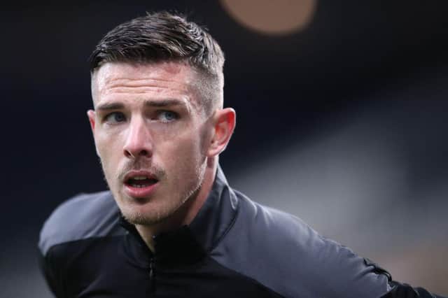 Ciaran Clark has signed a new two-year contract at Newcastle United.  (Photo by ALEX PANTLING/POOL/AFP via Getty Images)