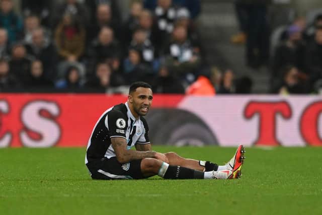 Callum Wilson of Newcastle United reacts with an injury during the Premier League match between Newcastle United  and  Manchester United at St James' Park on December 27, 2021 in Newcastle upon Tyne, England. (Photo by Stu Forster/Getty Images)