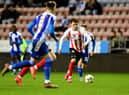 Nathan Broadhead playing for Sunderland against Wigan in the Carabao Cup.