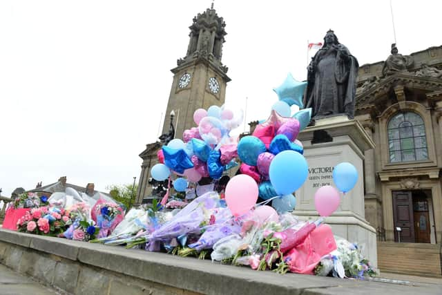 Tributes left at the Chloe Rutherford and Liam Curry memorial bench on a previous Pink and Blue Day