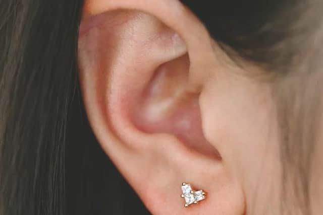 EARSASS GLAMOUR HEART
£19
Small heart stud, perfect for multiple lobe piercings. 
Available at https://earsass.com/products/the-glamour-heart
Cubic Zirconia Paved - 18k gold plated.