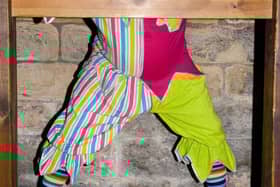 Even a jester's jokes can't save him from a trip to the stocks! Charlie Richmond, the lively performer at Newcastle Castle, finds himself in a tight spot, quite literally!