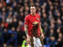 Phil Jones of Manchester United covered in mud during the FA Cup Fourth Round match between Tranmere Rovers and Manchester United. (Photo by Gareth Copley/Getty Images)