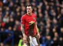 Phil Jones of Manchester United covered in mud during the FA Cup Fourth Round match between Tranmere Rovers and Manchester United. (Photo by Gareth Copley/Getty Images)