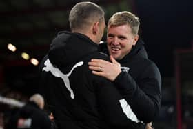 Graeme Jones embraces Bournemouth manager Eddie Howe last year.