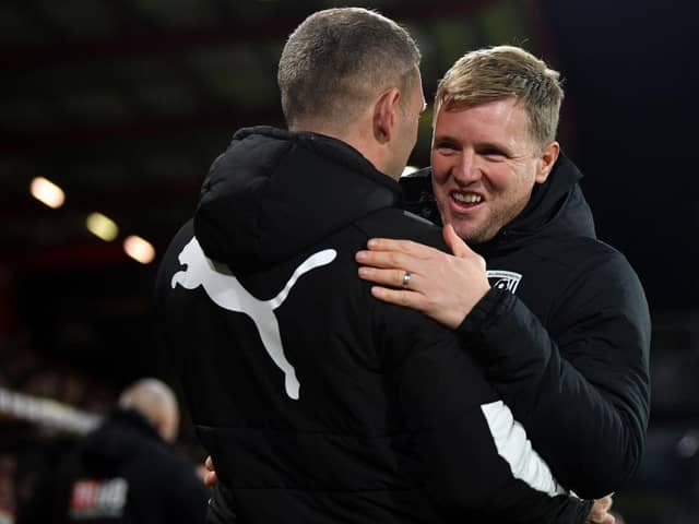 Graeme Jones embraces Bournemouth manager Eddie Howe last year.
