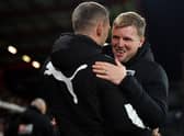 Graeme Jones embraces Bournemouth manager Eddie Howe last year.