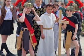 Pupils from St Cuthbert's take their performance to the streets.