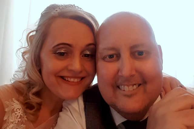 Terminal cancer patient Chris Clark, 43, who hosted his own wake last month to say goodbye to friends and family, and has now fulfilled his dying wish by marrying his "rock", partner Claire, 46, in a registry office ceremony in South Shields.