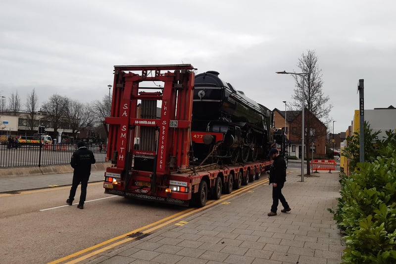 The lorry carrying Green Arrow reverses carefully toward Doncaster museum