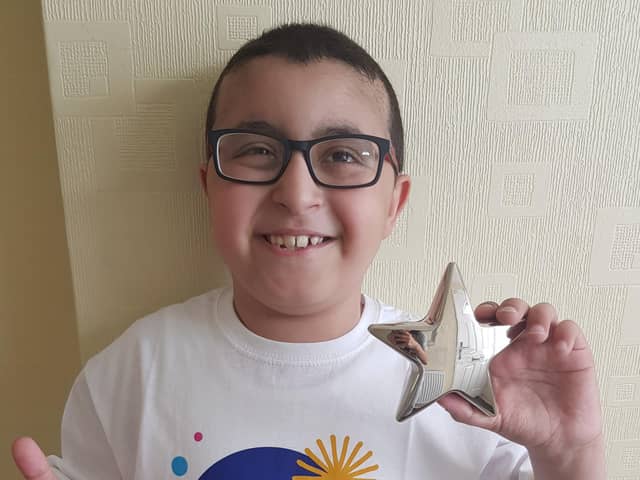 Mikail Hassan who was diagnosed with Hodgkin lymphoma and who is the face of the Cancer Research UK for Children & Young People Star Award, this year.