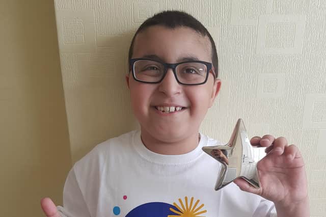 Mikail Hassan who was diagnosed with Hodgkin lymphoma and who is the face of the Cancer Research UK for Children & Young People Star Award, this year.
