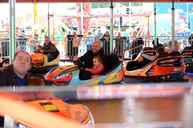 A turn on the bumper cars at the fairground.