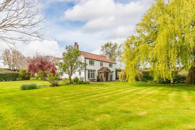 Featuring gardens spanning 1.75 acres, this detached five bedroom house has a value of £750,000.