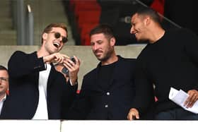 SUNDERLAND, ENGLAND - JULY 31: Sunderland chairman Kyril Louis-Dreyfus (l) shares a joke during the Sky Bet Championship between Sunderland and Coventry City at Stadium of Light on July 31, 2022 in Sunderland, England. (Photo by Stu Forster/Getty Images)