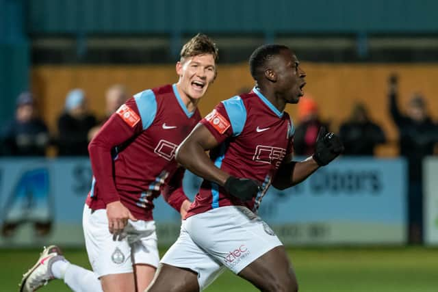 Cedric Main celebrates his goal, trailed by Dillon Morse. Photo: Craig McNair/ID Event Photography