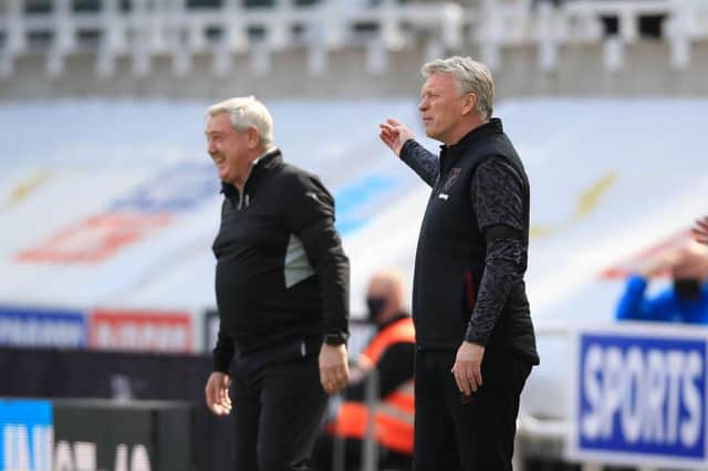 Steve Bruce, Manager of Newcastle United and David Moyes, Manager of West Ham. (Photo by Owen Humphreys - Pool/Getty Images)