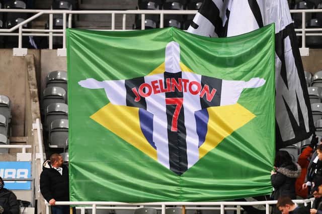 A flag in support of Joelinton of Newcastle United is seen inside the stadium prior to the Premier League match between Newcastle United and Watford at St. James Park on January 15, 2022 in Newcastle upon Tyne, England. (Photo by Stu Forster/Getty Images)