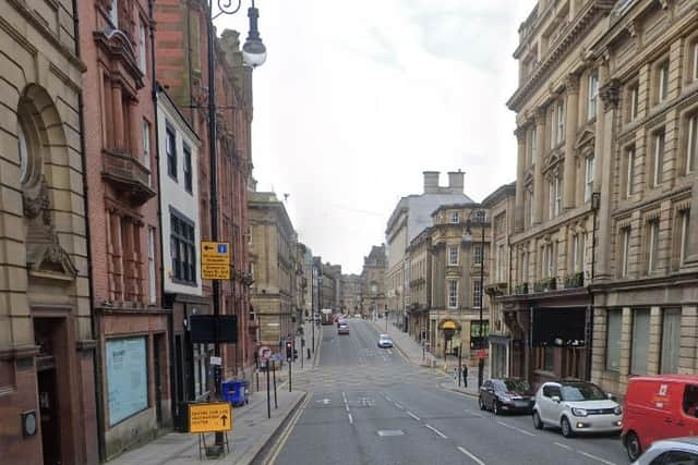 The woman was searched in Mosley Street.