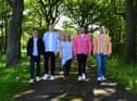 Angie Angus (centre) of Mental Health Concern, with four lads who have raised over £3000 for the charity, l-r Ethan Proud,Ben Robson, Nathan Johnson and Matthew Foster.