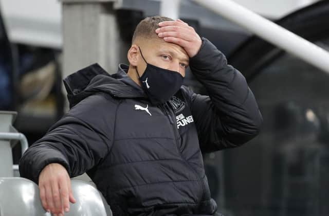 Dwight Gayle of Newcastle United looks on prior to the Premier League match between Newcastle United and Wolverhampton Wanderers at St. James Park on February 27, 2021 in Newcastle upon Tyne, England.