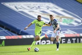Newcastle United's Brazilian striker Joelinton (L) vies with West Bromwich Albion's Irish defender Dara O'Shea (R) during the English Premier League football match between West Bromwich Albion and Newcastle United at The Hawthorns stadium in West Bromwich, central England, on March 7, 2021.
