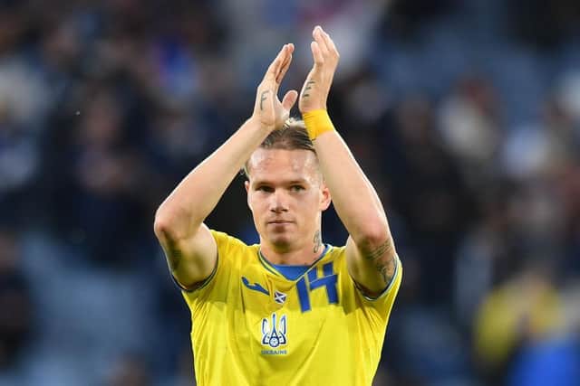 Mykhailo Mudryk of Ukraine applauds at the final whistle during the FIFA World Cup Qualifier between Scotland and Ukraine at Hampden Park on June 1, 2022 in Glasgow, Scotland. (Photo by Mark Runnacles/Getty Images)
