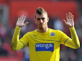 Newcastle United's Italian defender Davide Santon gestures to their fans after losing the English Premier League football match between Southampton and Newcastle United at St Mary's Stadium in Southampton, southern England on March 29, 2014. Southampton won 4-0. AFP PHOTO / GLYN KIRK
