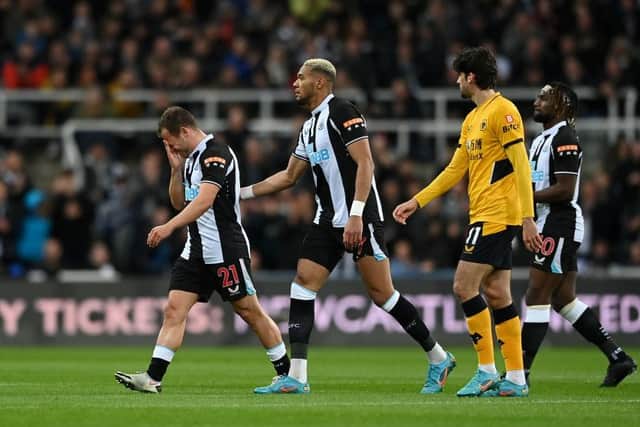 Ryan Fraser of Newcastle United reacts after picking up an injury before being substituted during the Premier League match between Newcastle United and Wolverhampton Wanderers at St. James Park on April 08, 2022 in Newcastle upon Tyne, England. (Photo by Stu Forster/Getty Images)