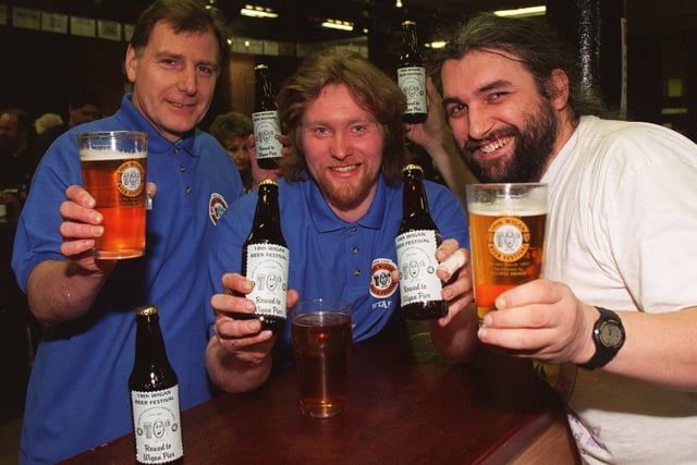 Celebrating the Tenth Wigan Beer Festival, being held at The Mill At The Pier, with a specially brewed secret recepie ale, are CAMRA members Dave Hughes, left, Damian Eccles and John Barlow.