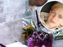 Archie Battersbee, inset, died on Saturday, August 6 after his treatment was withdrawn. Candles have been lit and flowers have been left outside the Royal London Hospital in Whitechapel. Pictures: Hollie Dance/PA.